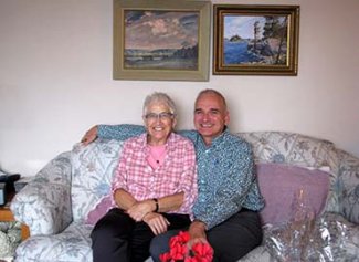 Peggy and James Sitting on a couch