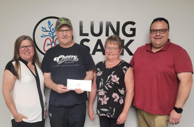 Ralph and Brenda Harris presenting Lung Sask staff with cheque from 3rd party fundraiser